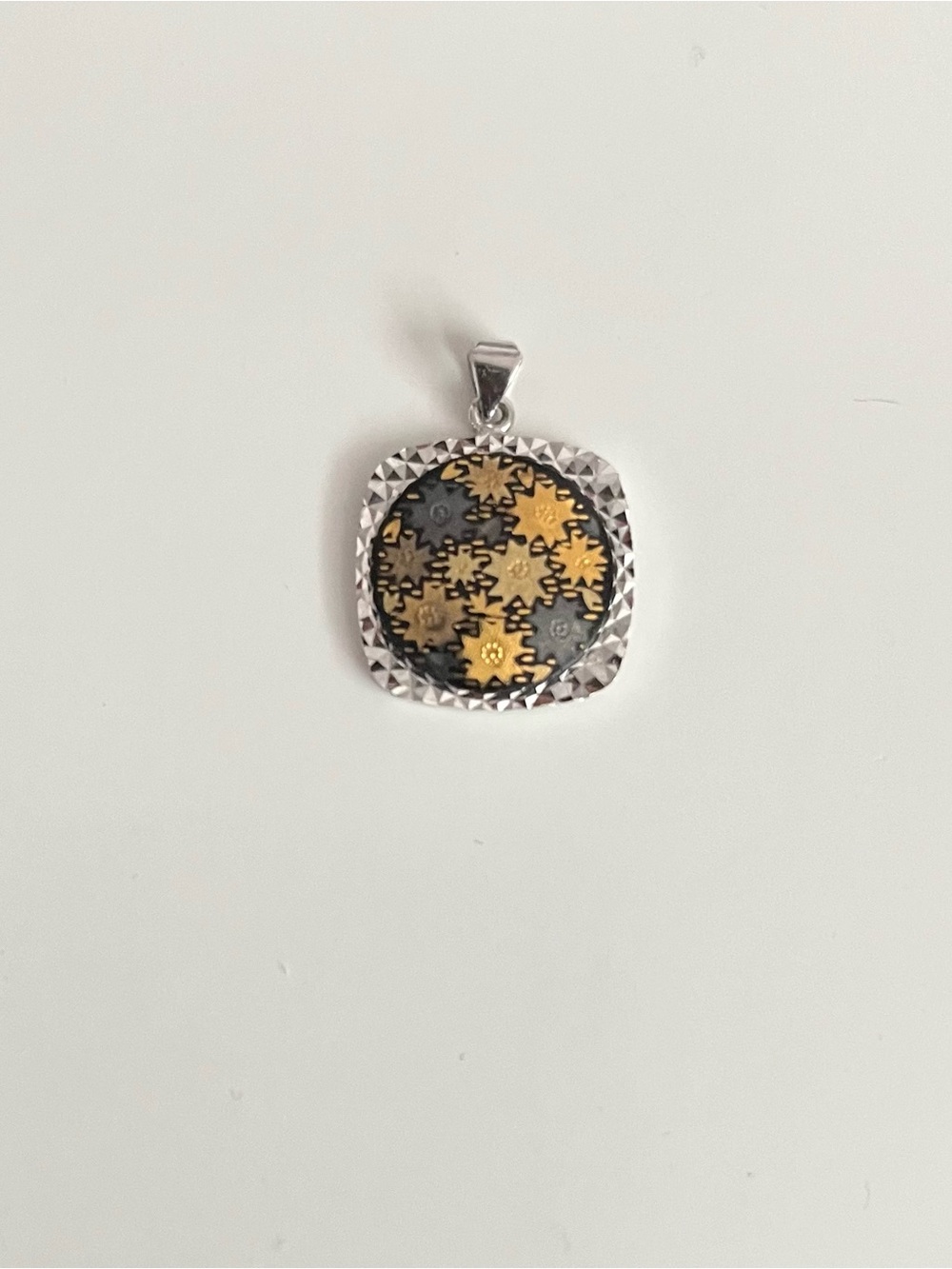 Silver Rhodium Pendant with Gold and Black Floral Medallion